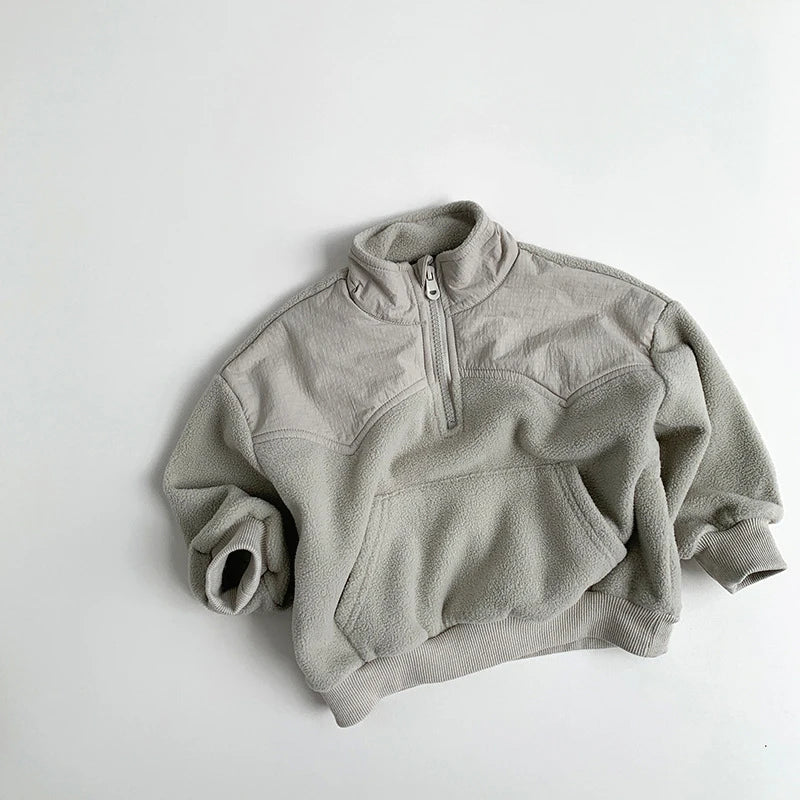 Light gray fleece pullover on a white background