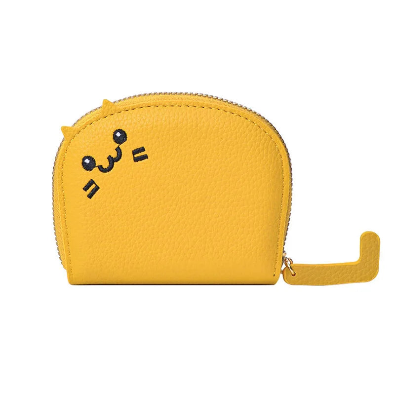 Yellow pouch with a cartoon face design on a white background