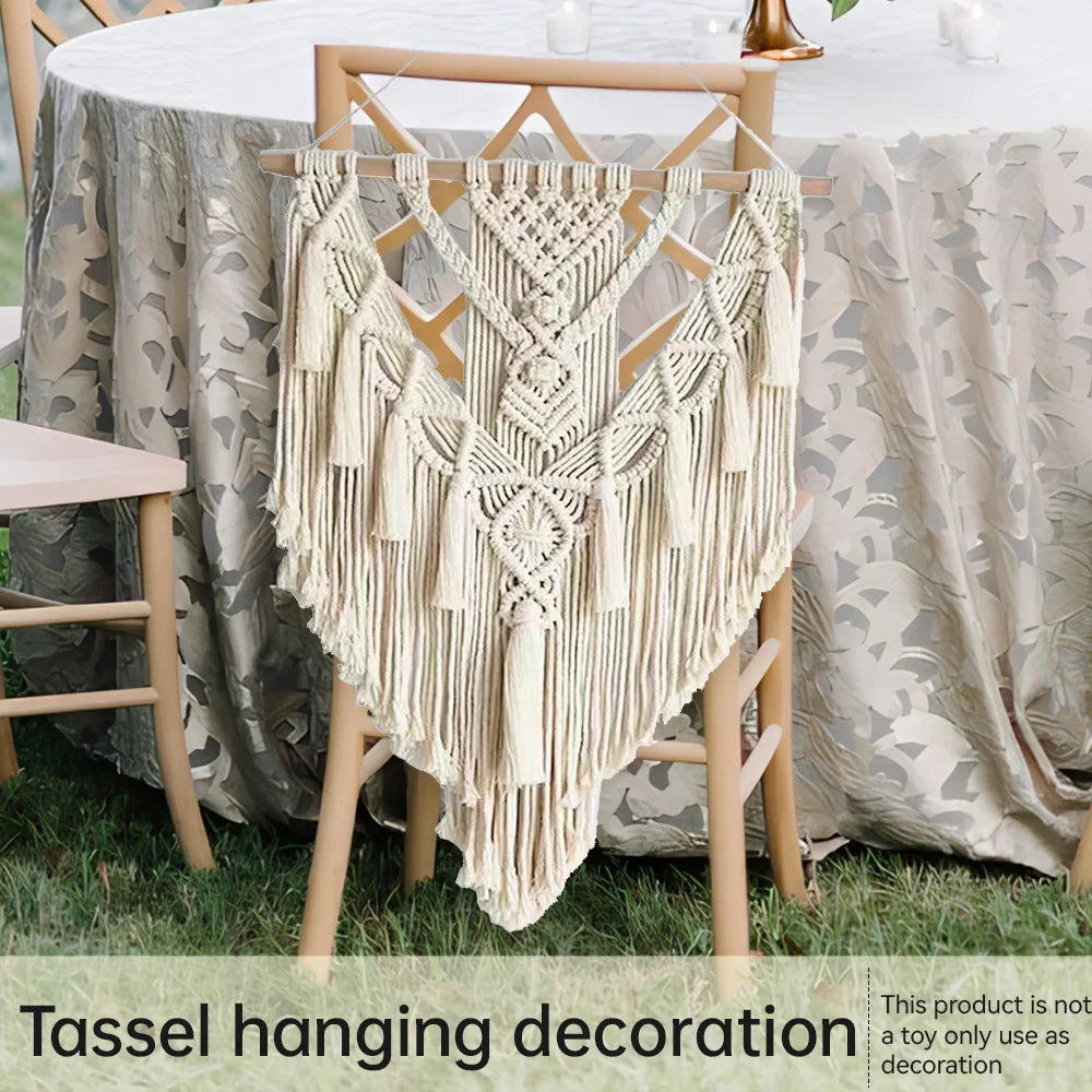 Tassel hanging decoration on a chair with a tablecloth and chairs in the background