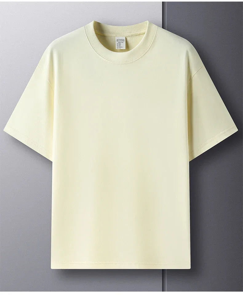 Light yellow t-shirt on a gray background
