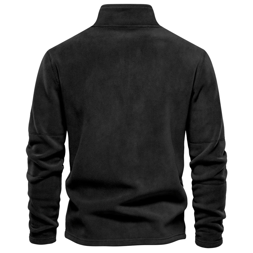 Black fleece jacket on a white background