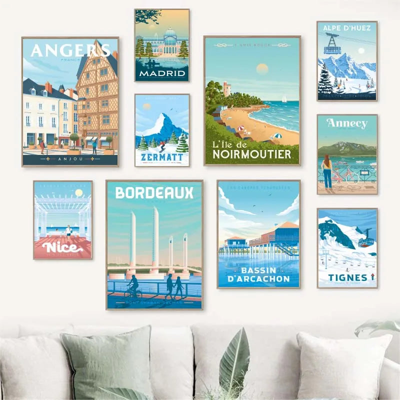 Collection of travel posters on a wall above a sofa
