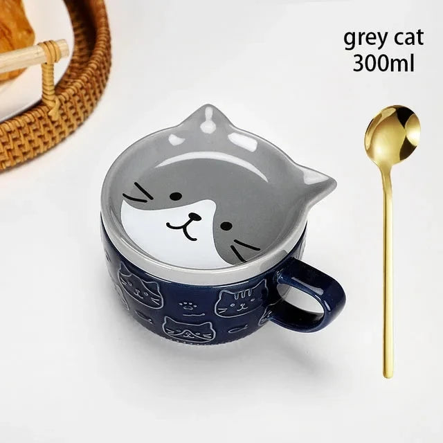 Cat-shaped mug with a lid, gold spoon, and text 'grey cat 300ml' on a white background.