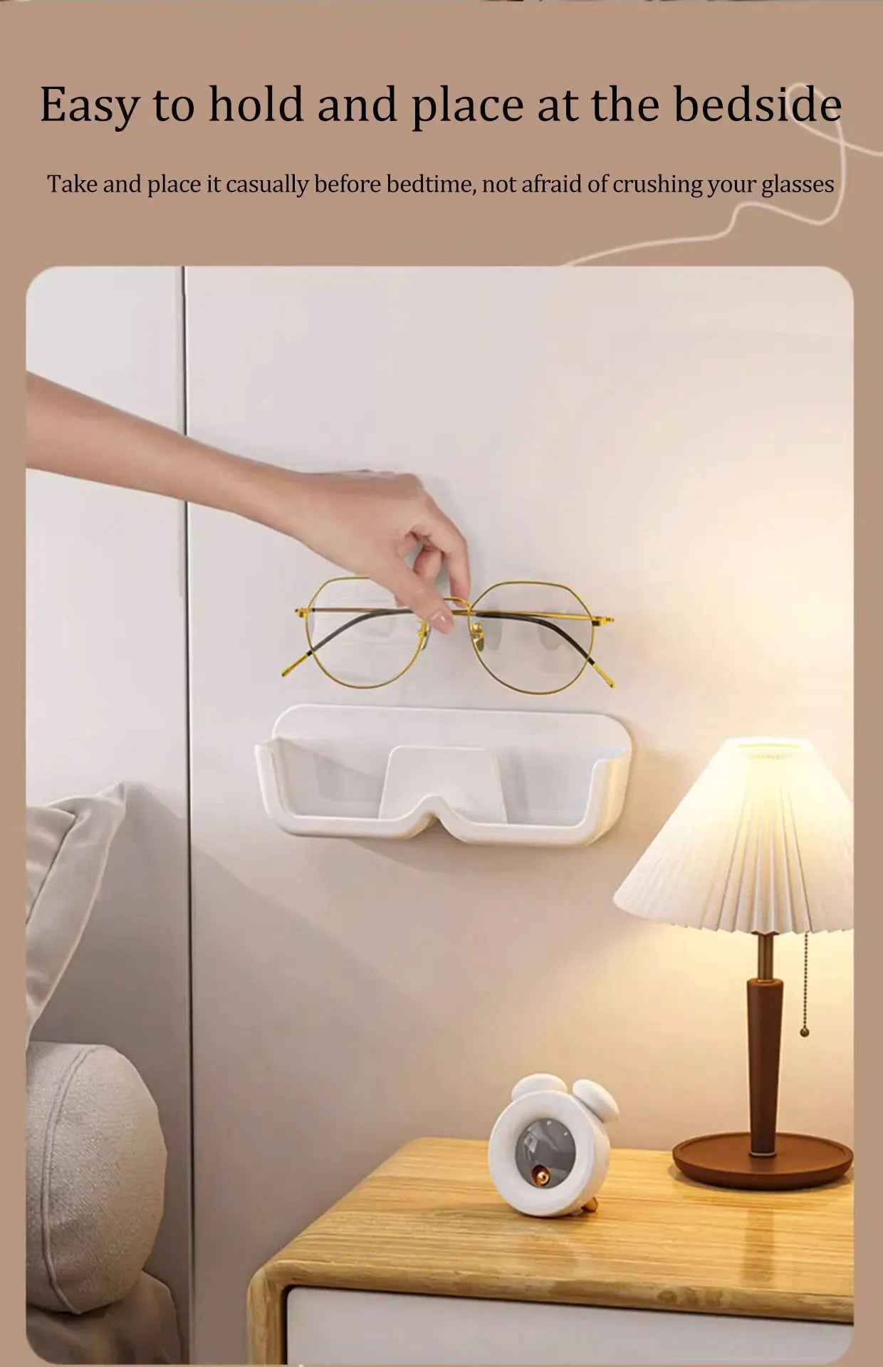 Wall-mounted glasses holder with a hand placing glasses into it, in a bedroom setting.