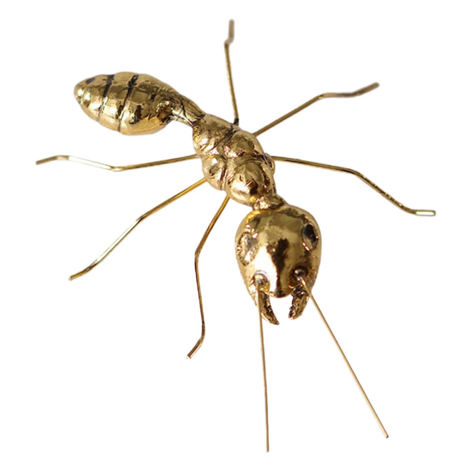 Gold ant figurine on a white background