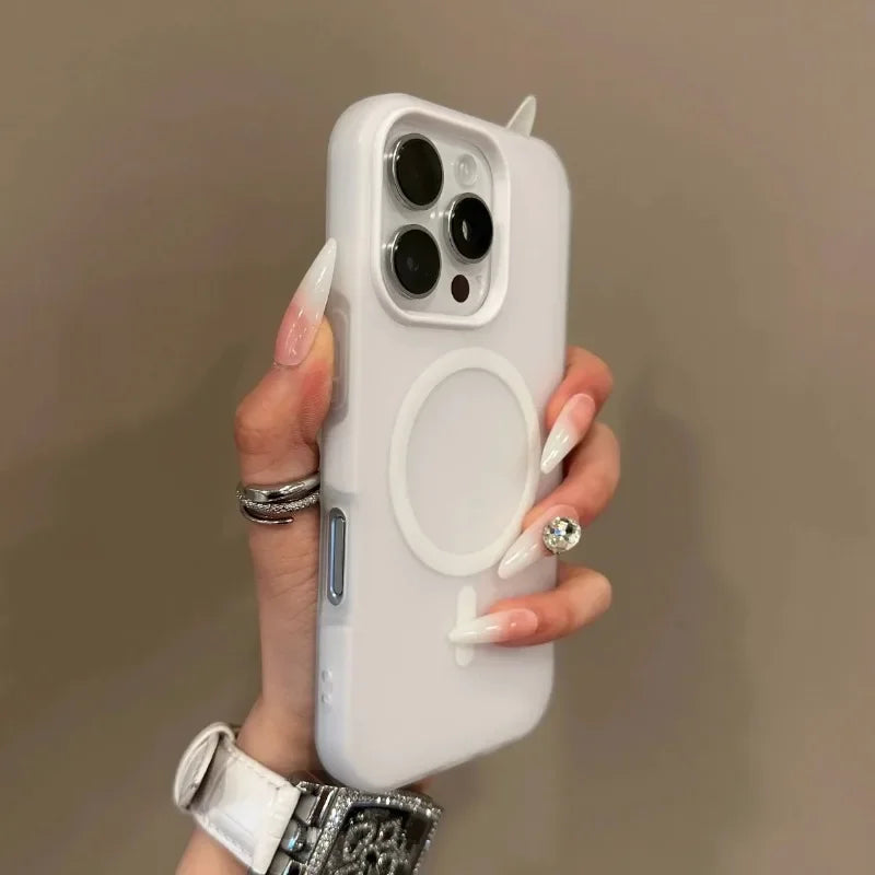 Hand holding a white phone case with a plain background