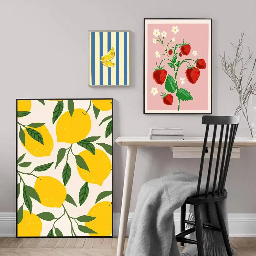 Decorative wall art with lemons, strawberries, and stripes in a home office setting.