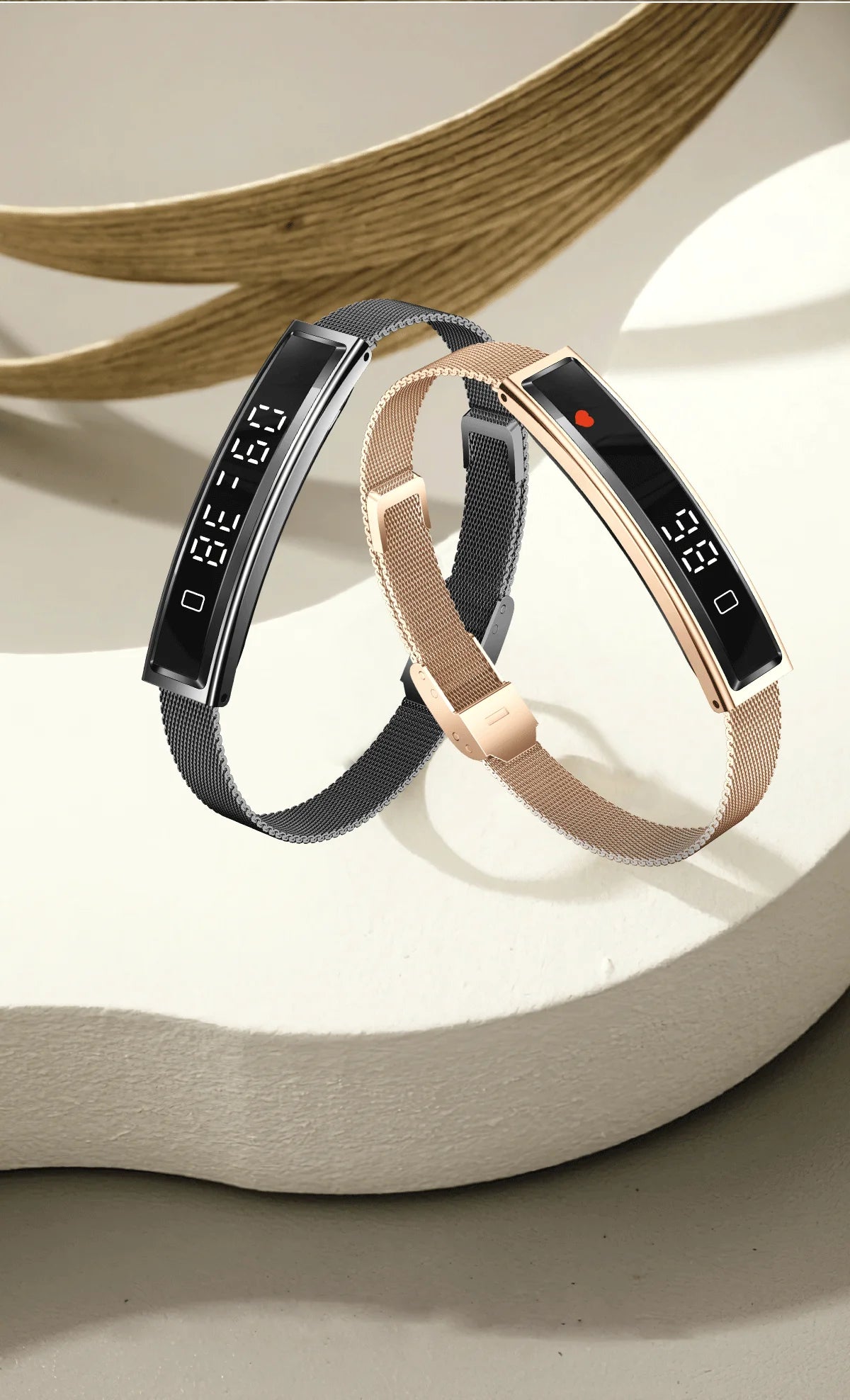 Smart fitness bracelet in gold and white, showing slim touchscreen and silicone/mesh straps.