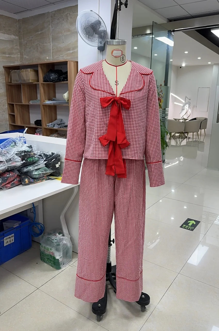 Red checkered outfit on a mannequin in an indoor setting