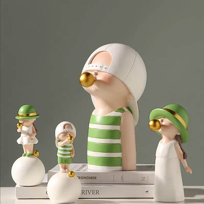 Cute Nordic style figurines with bubble gum detail in soft pastel colours, displayed as modern desk and shelf decor