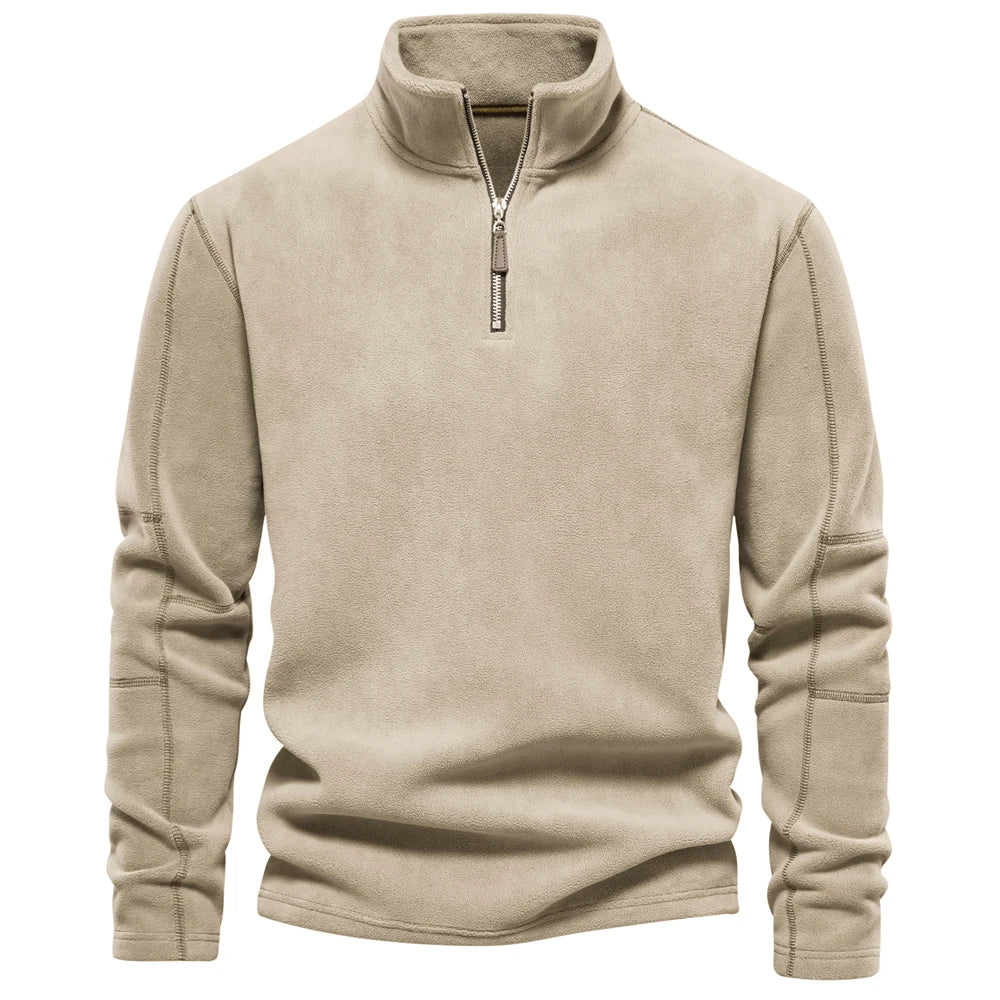 Beige fleece pullover with a quarter zip on a white background
