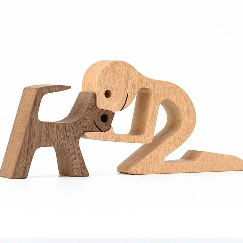 Two wooden dog figurines on a white background