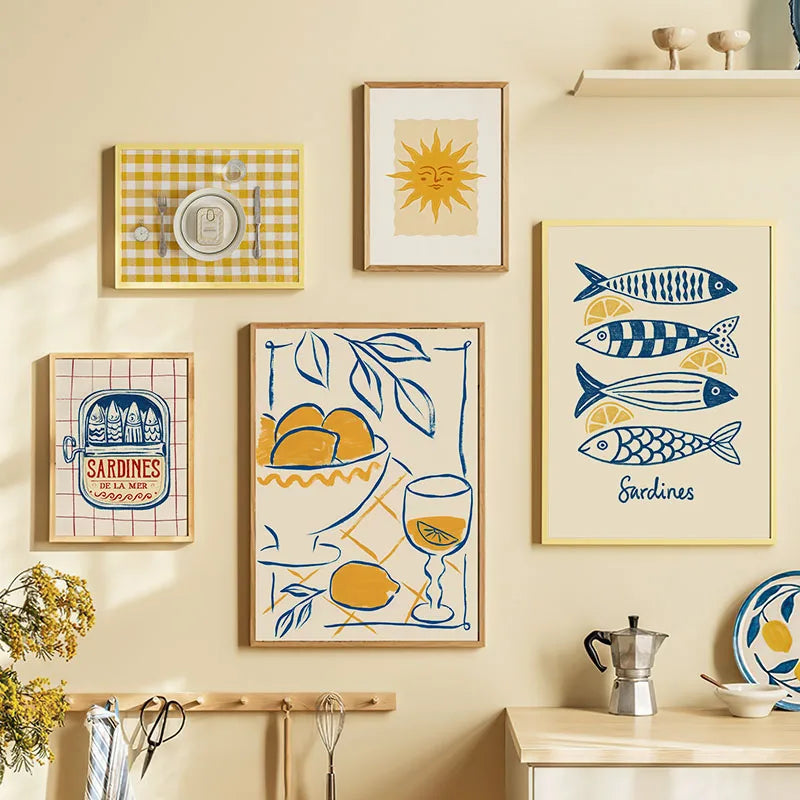 Mediterranean-inspired unframed canvas print featuring lemons, sardines and coastal artwork displayed in a bright contemporary kitchen.