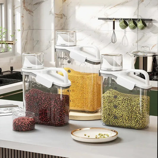 Set of clear containers with lids on a kitchen counter, filled with various foods.
