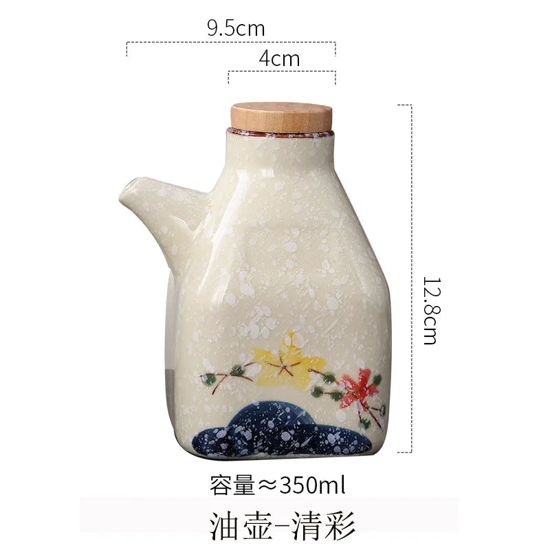 Ceramic oil container with floral design and measurements on a white background