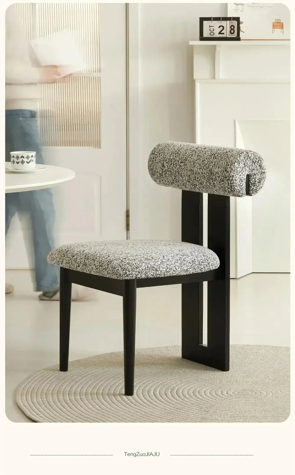 Modern chair with textured gray cushion on a light background