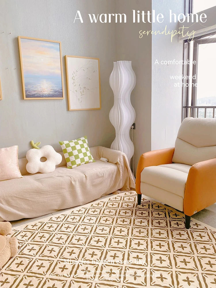 Cozy living room with a beige sofa, orange armchair, and decorative floor lamp.