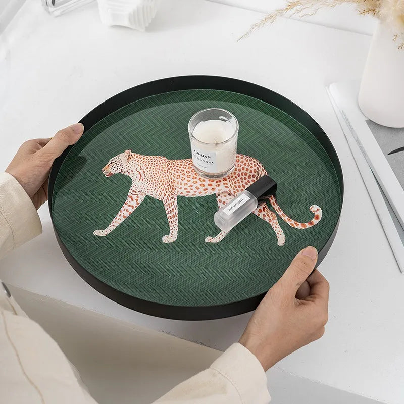 Green metal decorative tray with illustrated leopard design and black rim