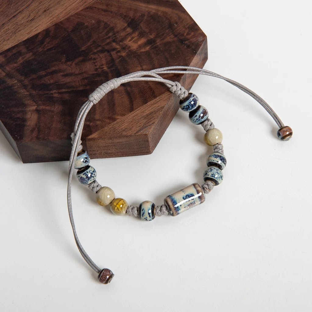 Beaded bracelet with colorful beads on a wooden block