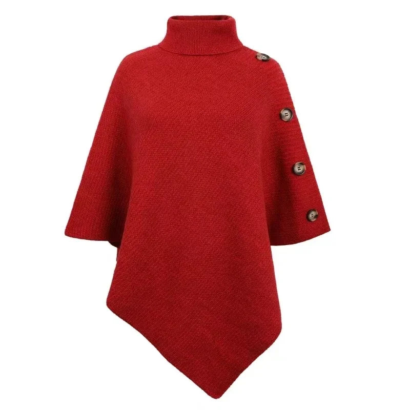 Red poncho with button details on a white background