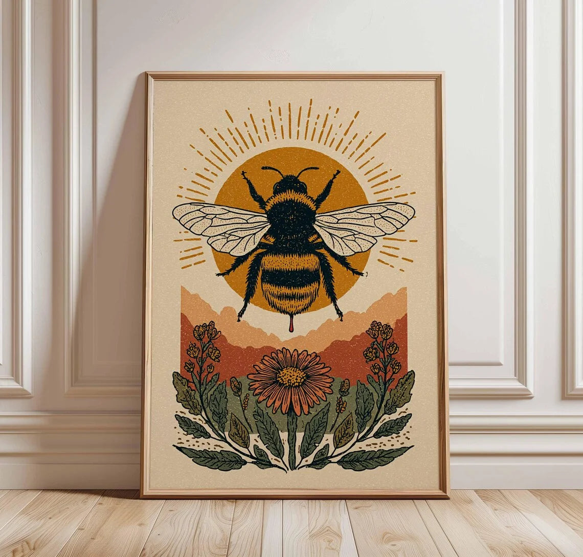 Framed artwork of a bee and flowers on a beige background