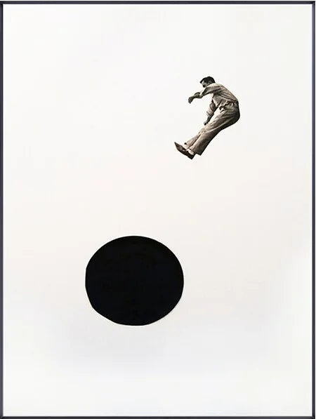 Black and white illustration of a person leaping over a large black circle on a white background