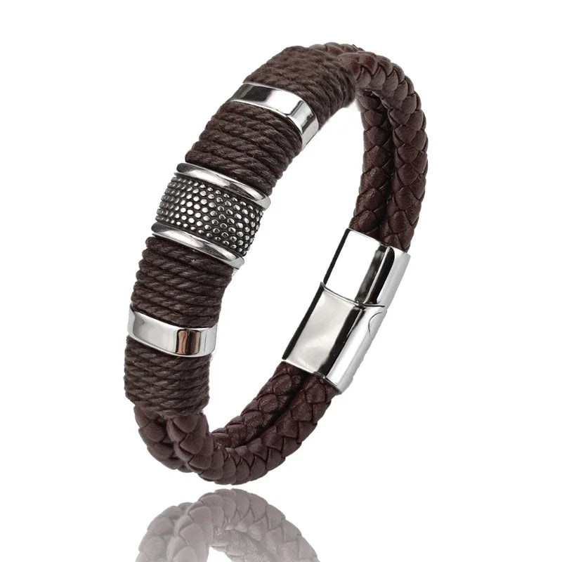 Brown braided bracelet with silver metal accents on a white background