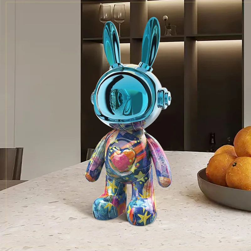 Colorful bunny figurine with a transparent blue head on a table.