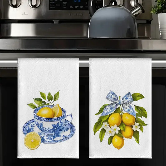 Blue and white lemon kitchen tea towels hanging on oven handle decorative dish drying towel set