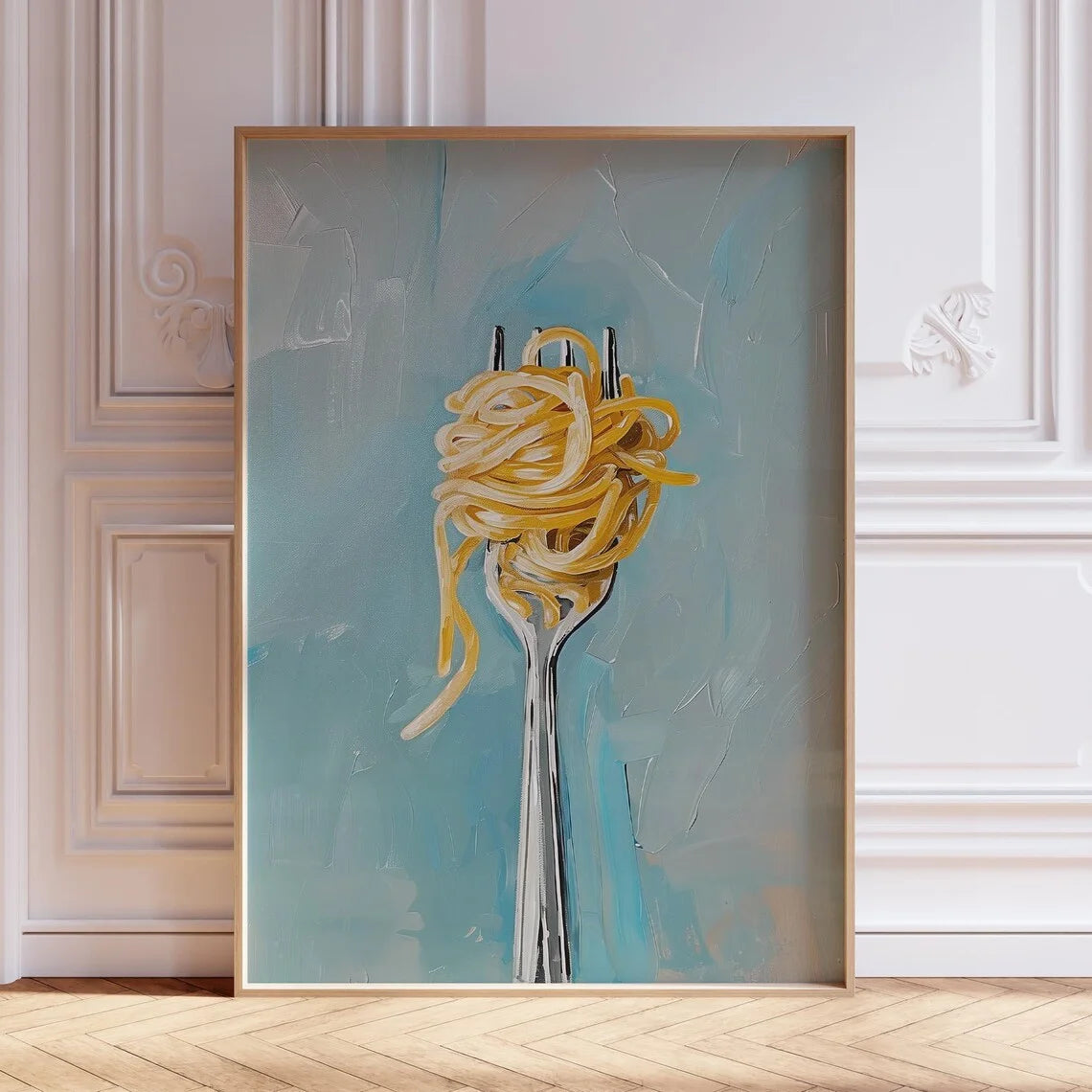 Framed artwork of a fork with noodles against a textured blue background