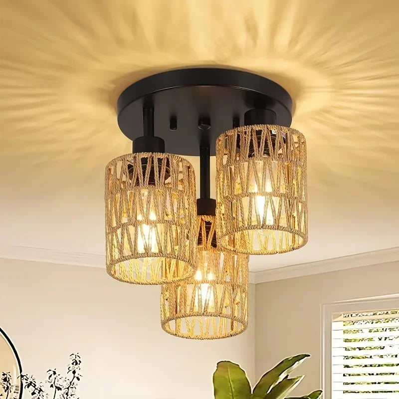 Ceiling light fixture with gold cage design on a neutral ceiling
