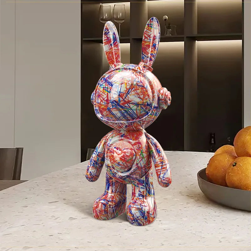 Colorful abstract rabbit sculpture on a table with a neutral background