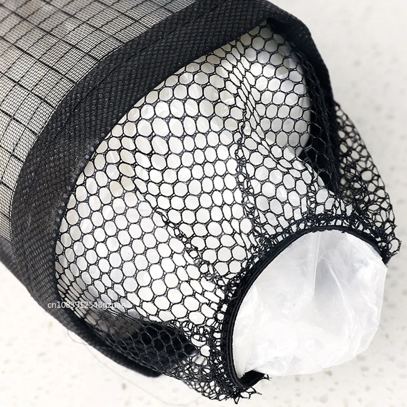 Black mesh lingerie bag with white interior on a light background