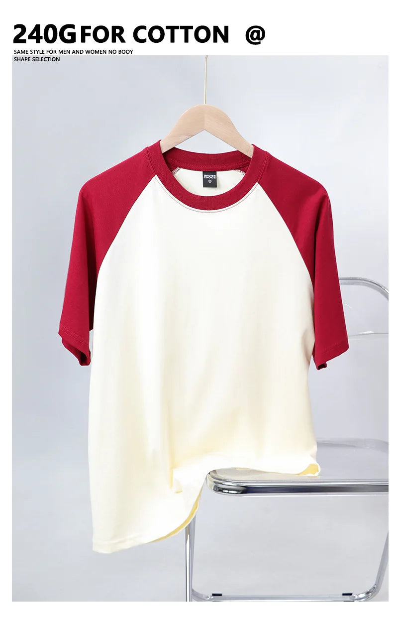 Red and white baseball shirt on a hanger against a white background