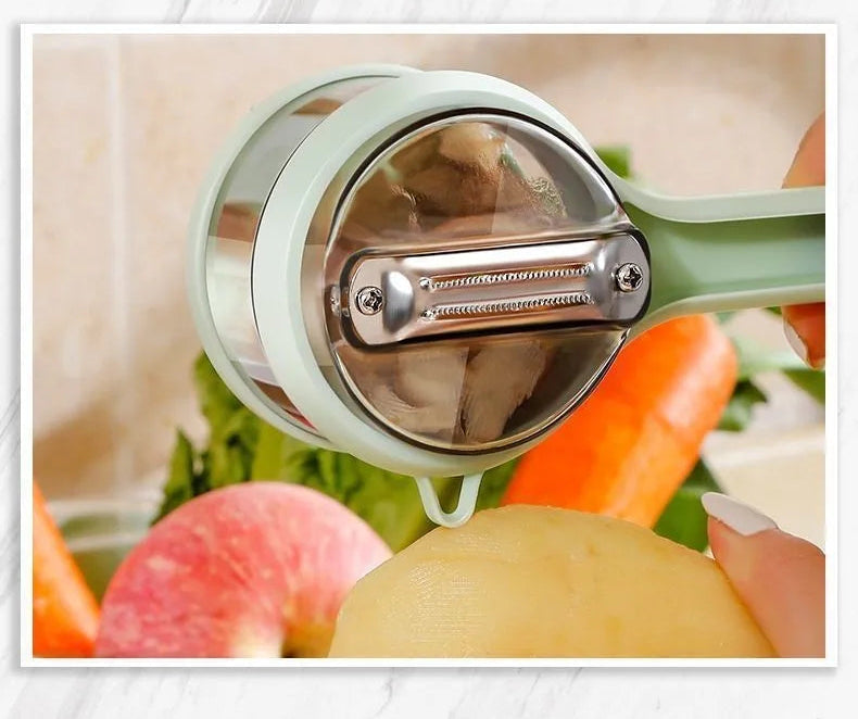 Vegetable peeler with a potato on a white background