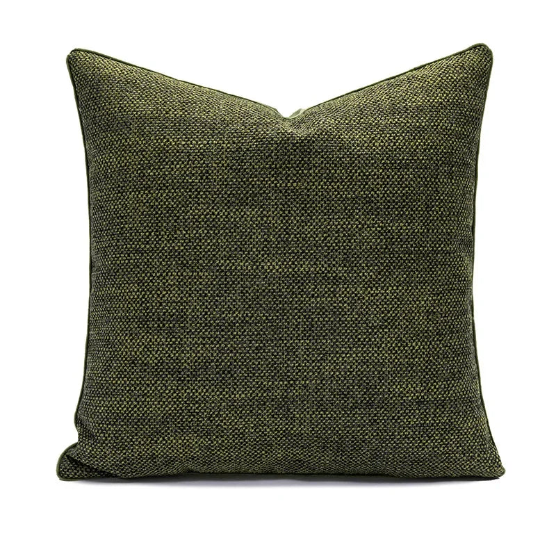 Green textured pillow on a white background
