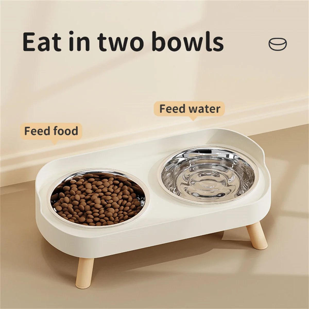 Pet feeding station with two bowls for food and water on a beige background