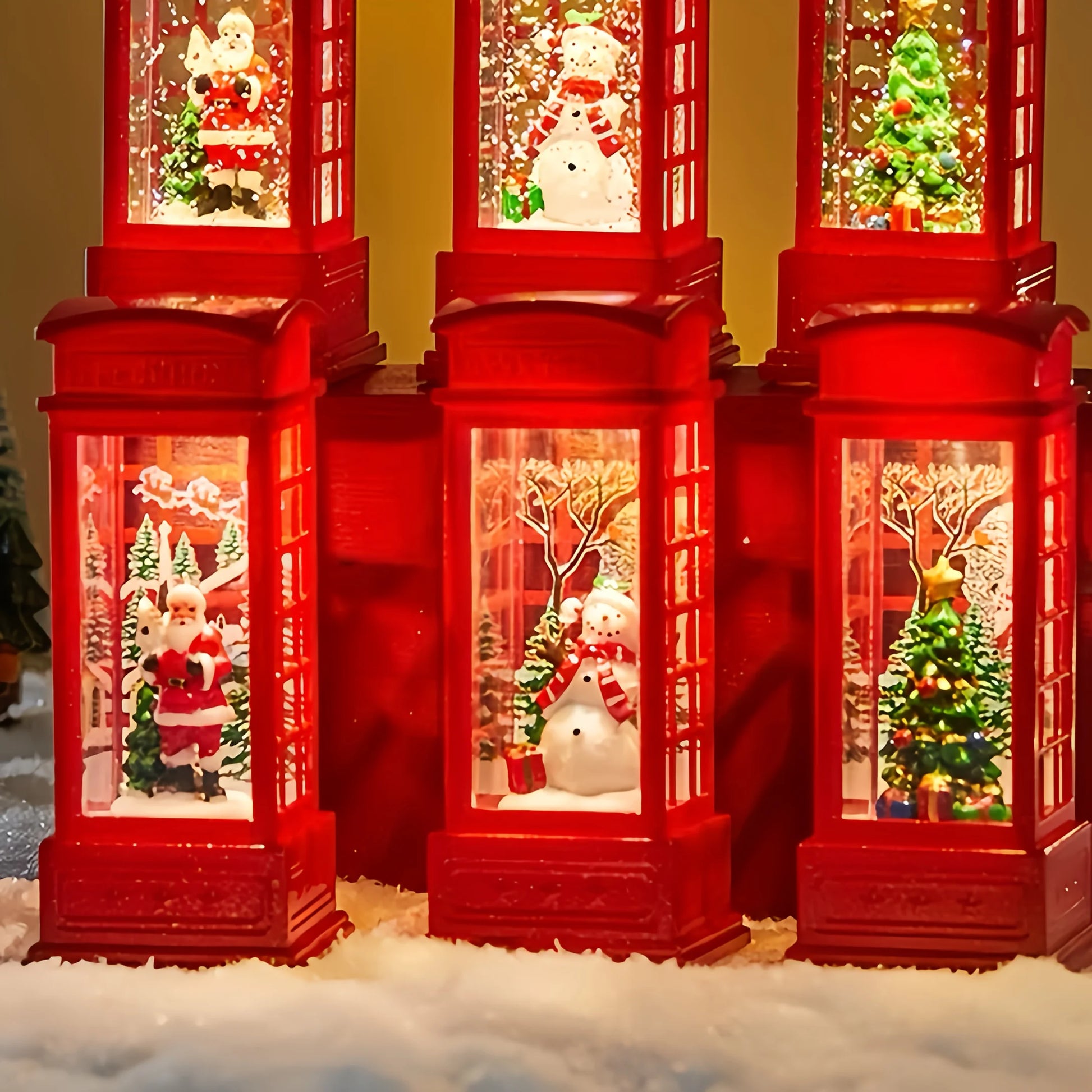 Set of red Christmas lanterns with Santa Claus, snowman, and Christmas trees inside.