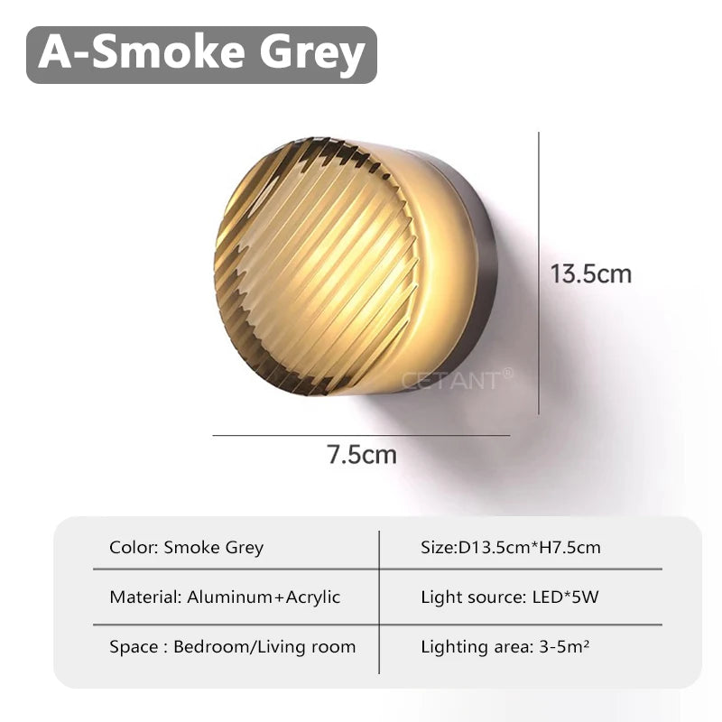 Smoke grey wall light fixture with dimensions and features on a white background