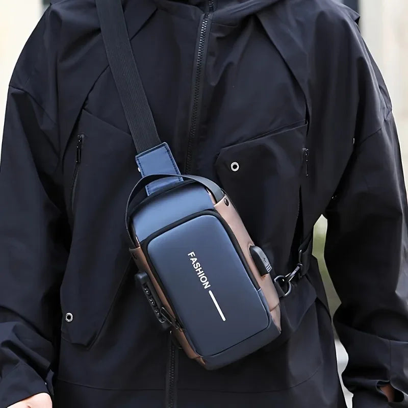 Person wearing a black jacket with a blue crossbody bag labeled 'FASHION'.