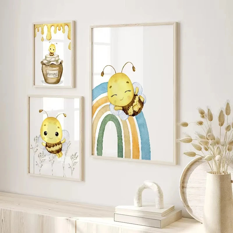 Set of three framed illustrations of a bee on a white wall with decorative elements.