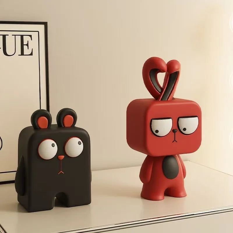 Funny bear and bunny resin ornaments with cartoon facial expressions displayed on a modern shelf for quirky home decor styling