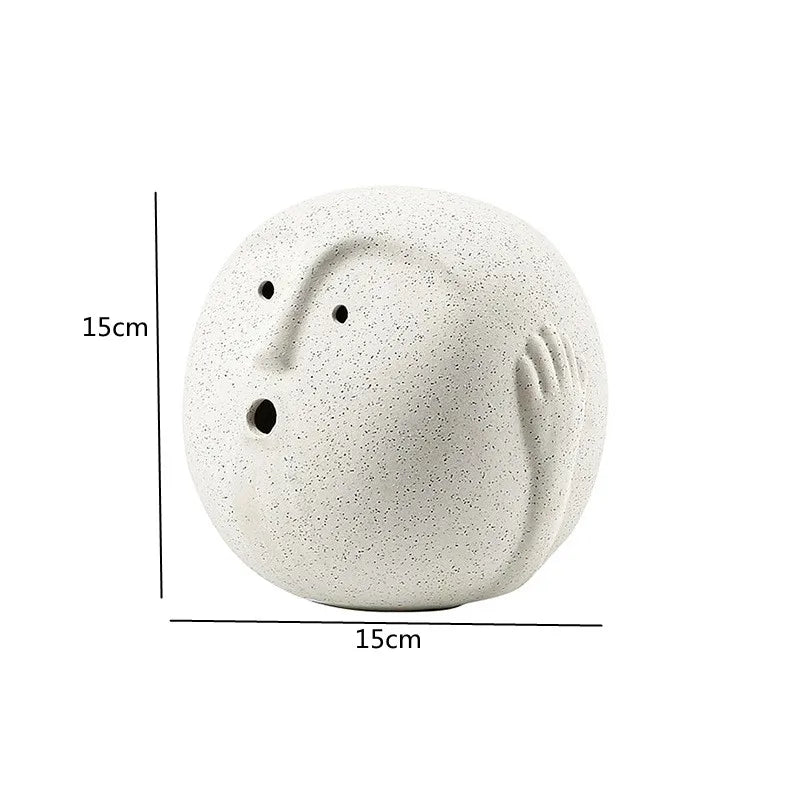 White stone-like object with measurements on a white background