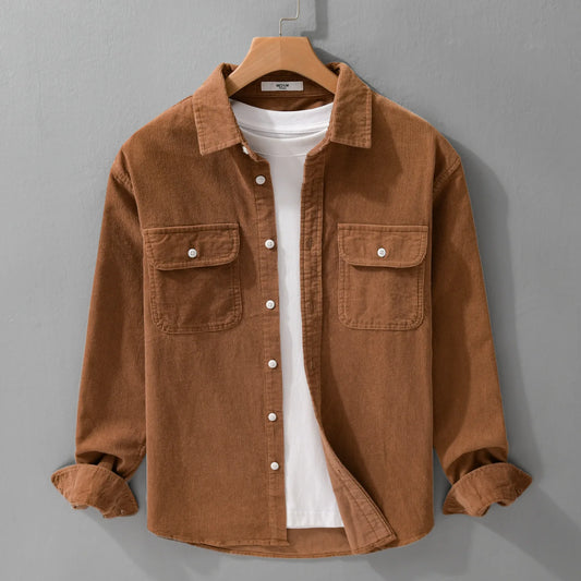 Vintage men’s corduroy cotton shirt with long sleeves and large front pockets in a casual autumn style