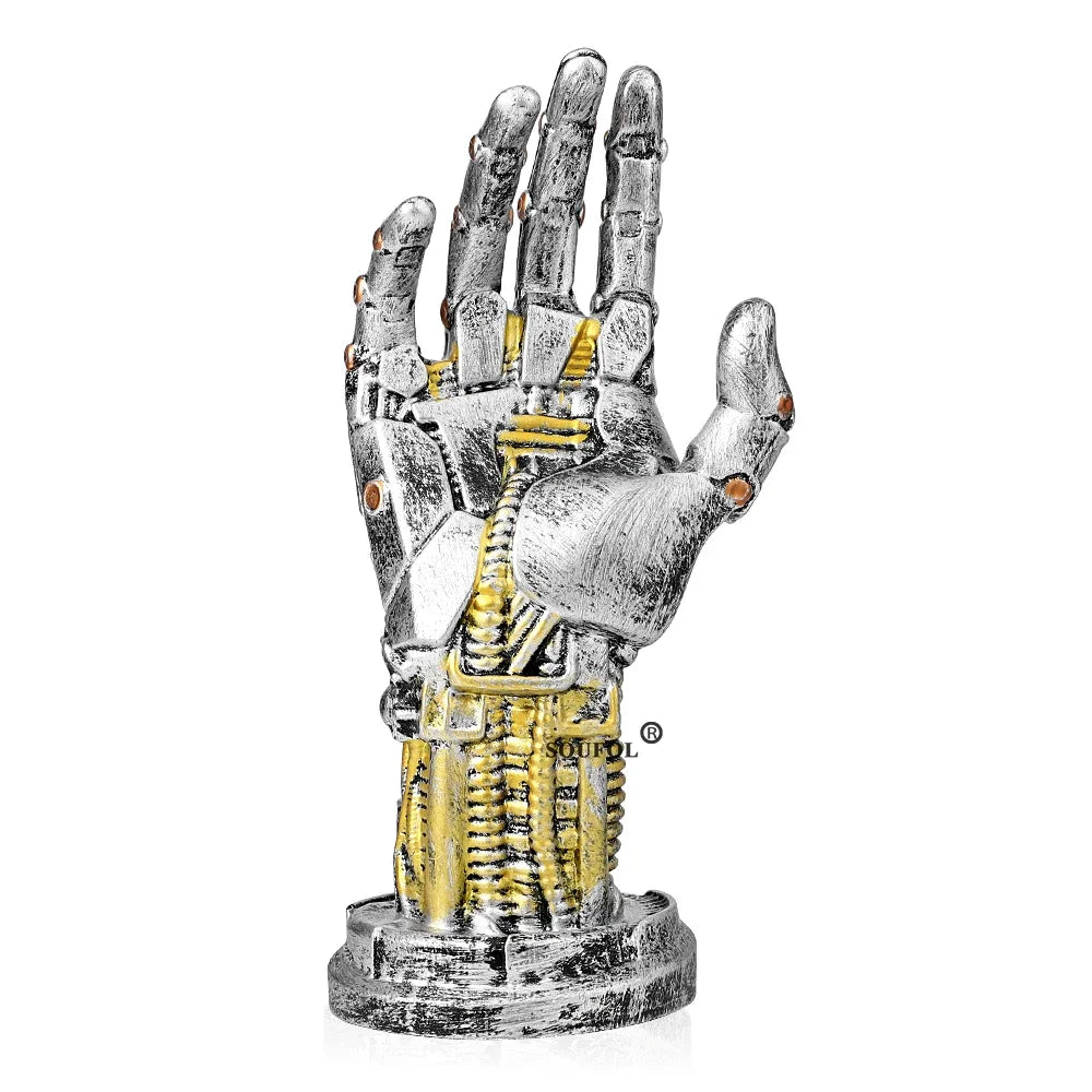Metallic hand sculpture with mechanical design on a white background