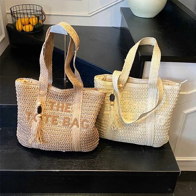 Two woven handbags on a black surface with a kitchen background.