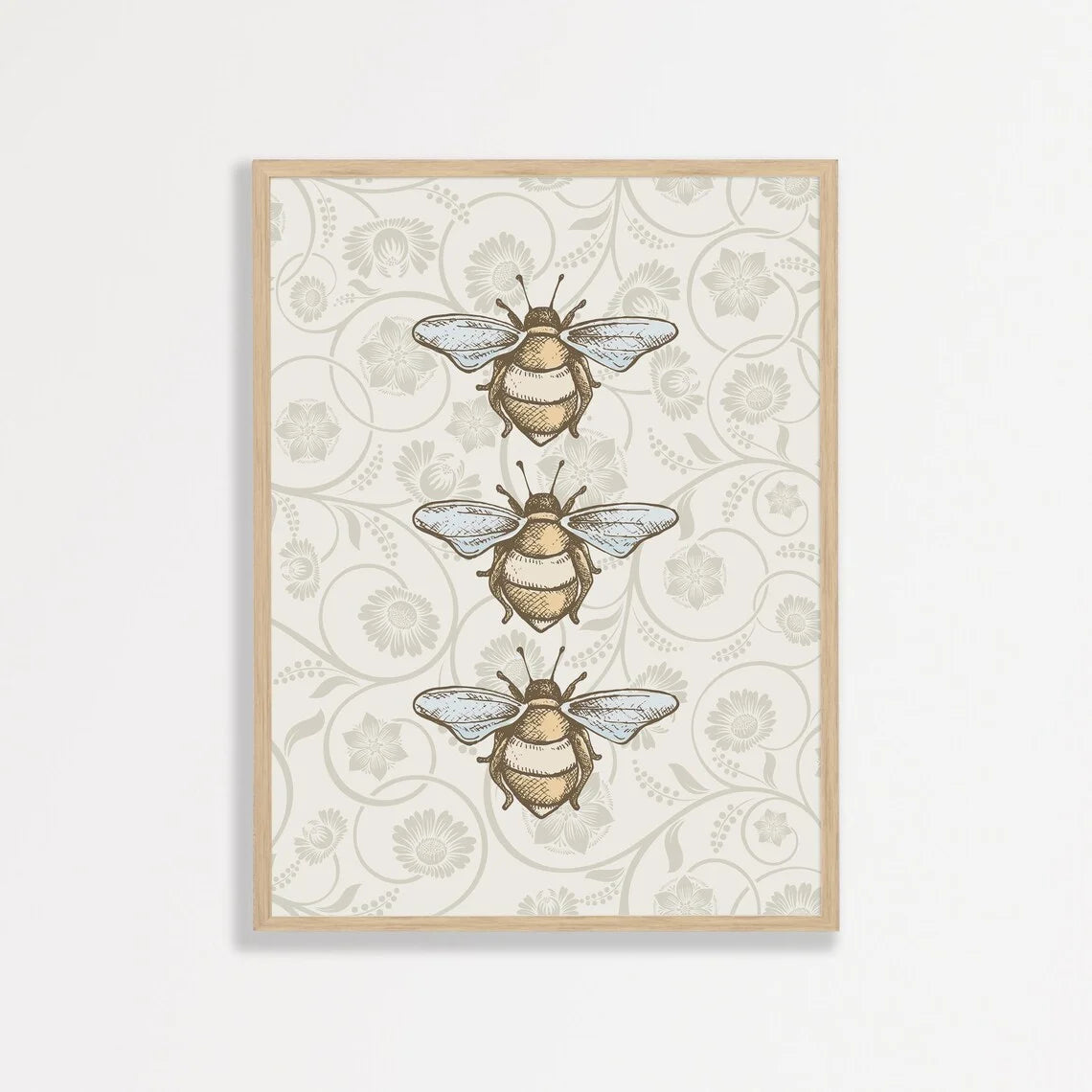 Framed artwork with bee illustrations on a patterned background