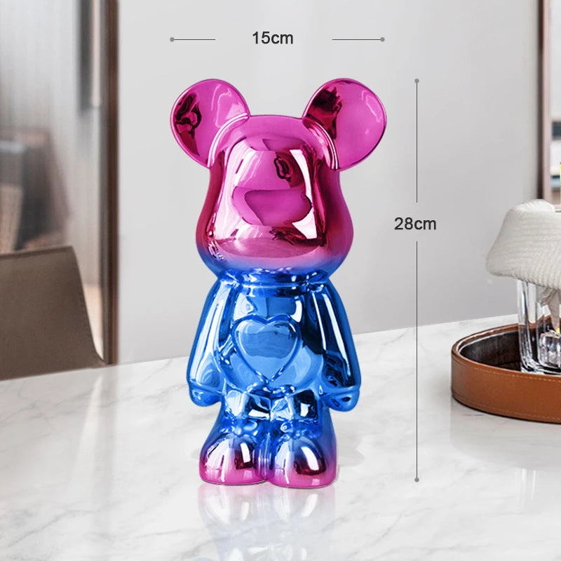 Colorful bear-shaped object on a table with measurements indicated