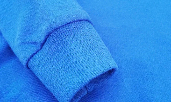 Close-up of a blue fabric with a textured pattern