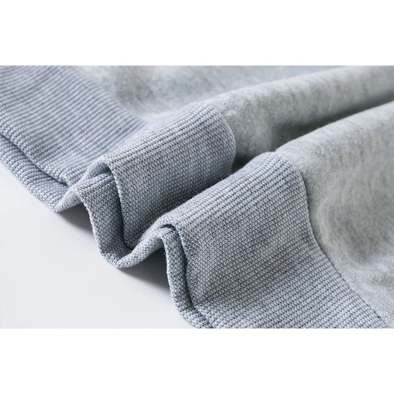 Close-up of a textured gray fabric on a white background